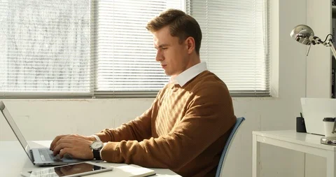 Businessman working in the office Stock Footage 100959050