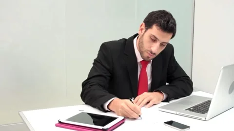  Businessman working in office  Stock-Footage 210660882