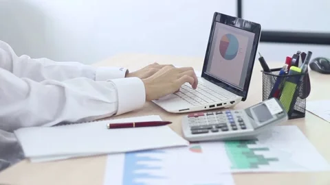 Businessman working in the office using a modern laptop  Stock Footage 87085883