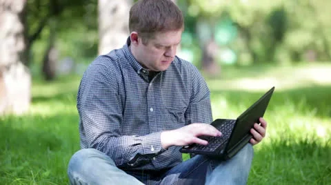 Businessman working in the park. Stock Footage 25301899