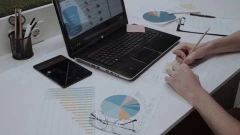 Businessman Working On Pie Chart Statistics Stock Footage 84731224