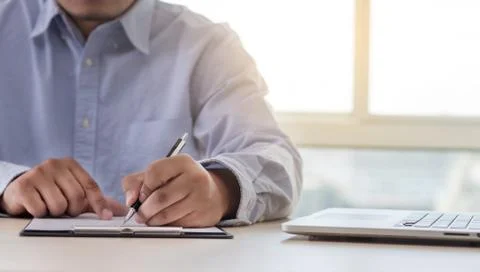 Businessman working reading documents graph financial to job succes Analyze d Stock Photos