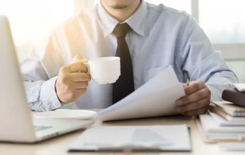 Businessman working reading documents graph financial to job succes Analyze d Stock Photos