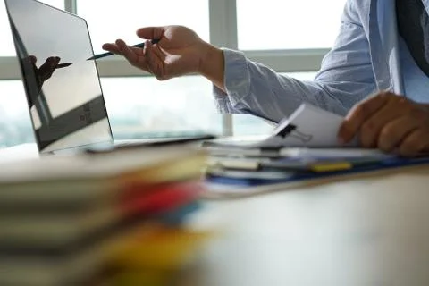 Businessman working reading documents graph financial to job succes Analyze d 库存照片