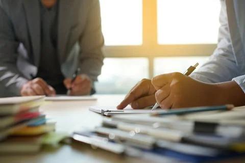 Businessman working reading documents graph financial to job succes Analyze d Stock Photos