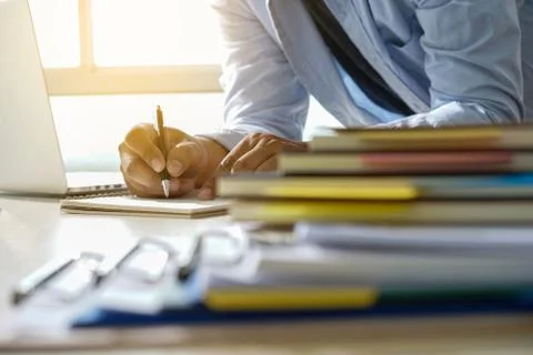 Businessman working reading documents graph financial to job succes Analyze d 스톡 사진