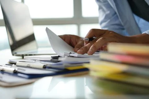 Businessman working reading documents graph financial to job succes Analyze d 库存照片