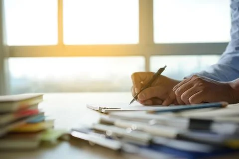 Businessman working reading documents graph financial to job succes Analyze d 写真素材