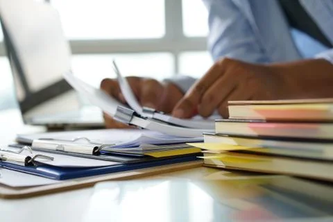Businessman working reading documents graph financial to job succes Analyze d 库存照片
