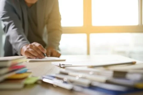 Businessman working reading documents graph financial to job succes Analyze d 库存照片