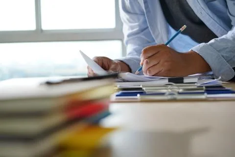 Businessman working reading documents graph financial to job succes Analyze d 스톡 사진