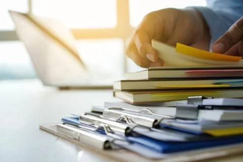 Businessman working reading documents graph financial to job succes Analyze d 库存照片