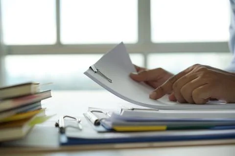 Businessman working reading documents graph financial to job succes Analyze d 写真素材