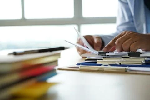 Businessman working reading documents graph financial to job succes Analyze d 스톡 사진