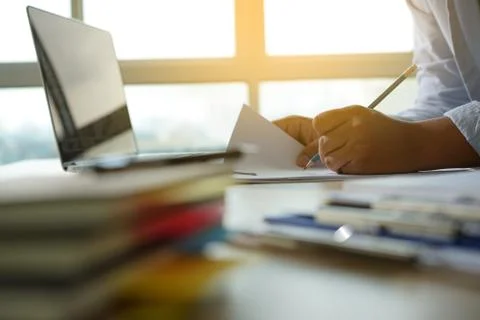 Businessman working reading documents graph financial to job succes Analyze d 스톡 사진