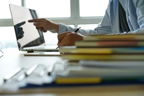Businessman working reading documents graph financial to job succes Analyze d 스톡 사진