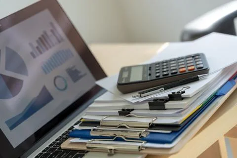 Businessman working reading documents graph financial to job succes Analyze d 스톡 사진