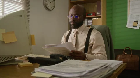 Businessman Working on Retro Computer, Reading Documents Stock-Footage 341421474