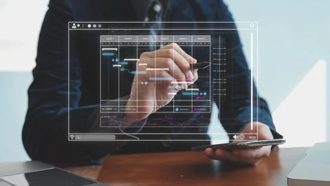 Businessman working on scheduling main project on his tablet in office Stock Footage 325309070