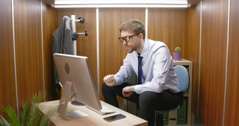 Businessman working in a small office Stock Footage 309000505