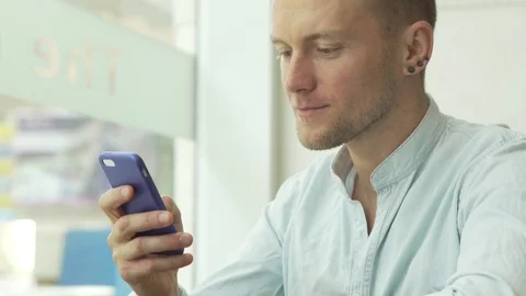 Businessman working on smartphone Stock Footage 79048842