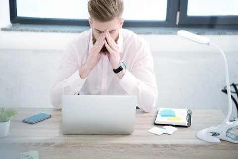 Businessman working at table Stock Photos
