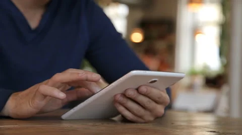 Businessman working on tablet computer in cafe Stock Footage 67862423