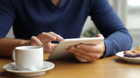 Businessman working on tablet computer in the cafe Stock Footage