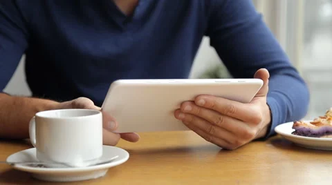 Businessman working on tablet computer in the cafe Stock Footage 67863042