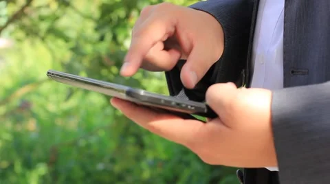 Businessman working on tablet computer Stock Footage 44440481