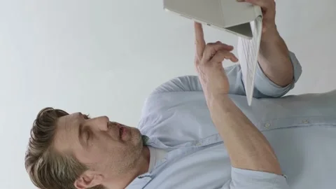 Businessman working on tablet computer in hand. Stock Footage 201034080