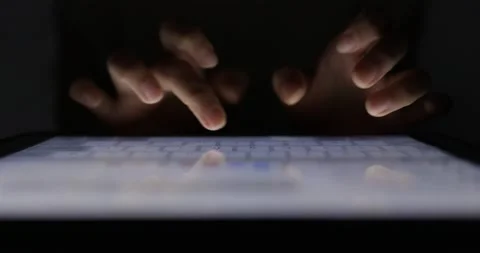 Businessman working on tablet at night, close-up Cropped Hands Typing On digi Stock Footage 228674579