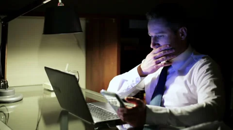 Businessman working on technology and comparing some data. Stock Footage 36909311