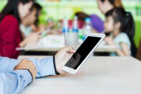 Businessman working by using digital tablet Stock Photos