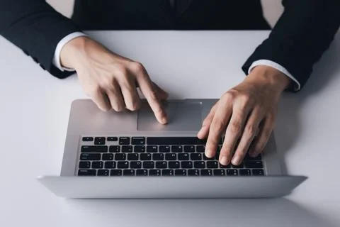Businessman working using laptop computers Liaise with customers and plan bus Stock Photos