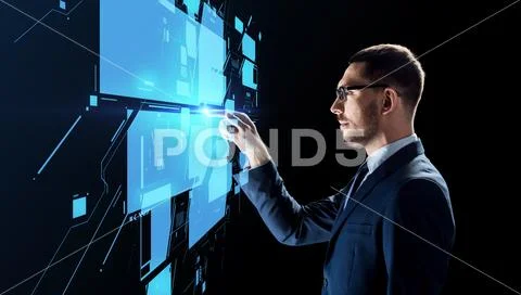 Businessman working with virtual screen Stock Photos