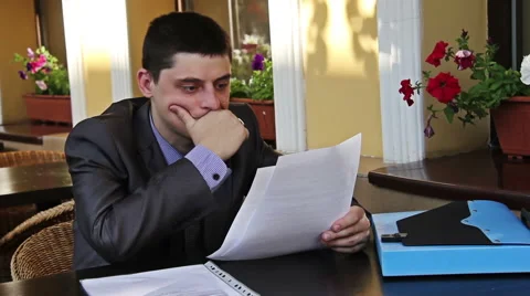 Businessman works with documents at the table Stock Footage 40311311