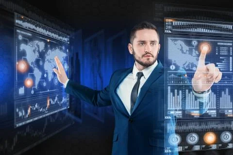 Businessman works with virtual holographic interface. Future technology concept Stock Photos