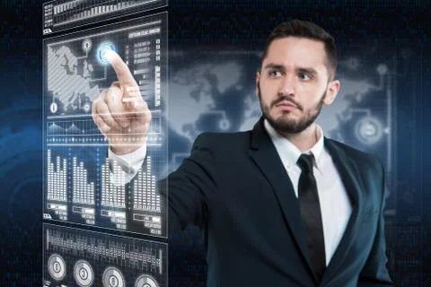 Businessman works with virtual holographic interface. Future technology concept Stock Photos