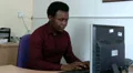 Businessman worried as he types on computer HD Footage