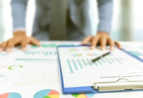Businessman write business plan with chart Stock Photos