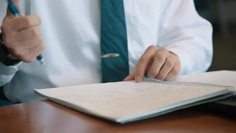 Businessman Writes in Notebook Stock Footage 86881270