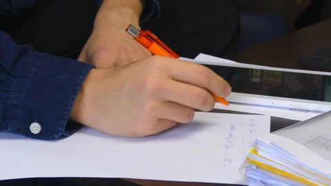 Businessman Writes Notes For The Day Vídeo Stock 98282092