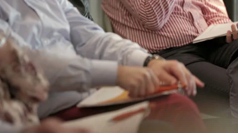 A businessman, writing in a notebook Stock Footage 37098436