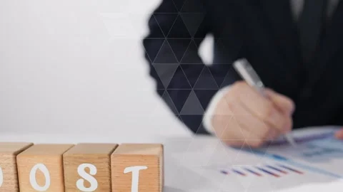 Businessman Writing Notes With Boost Hologram Stock Footage 327723237