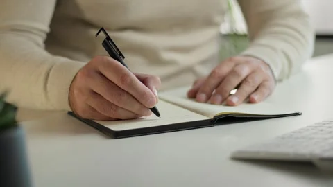 Businessman Writing Notes In Notebook Desk Stock Footage 346840962