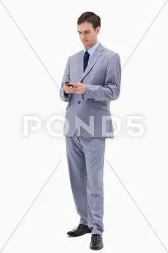 Businessman writing text message Stock Photos