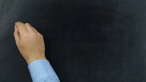 Businessman writing tutorial on chalkboard or blackboard Video stock 70756564