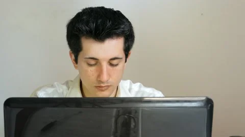 Businessman yawning at the computer Stock Footage 61493963