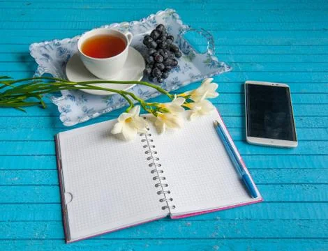 Businessman's breakfast on a blue table Stock Photos